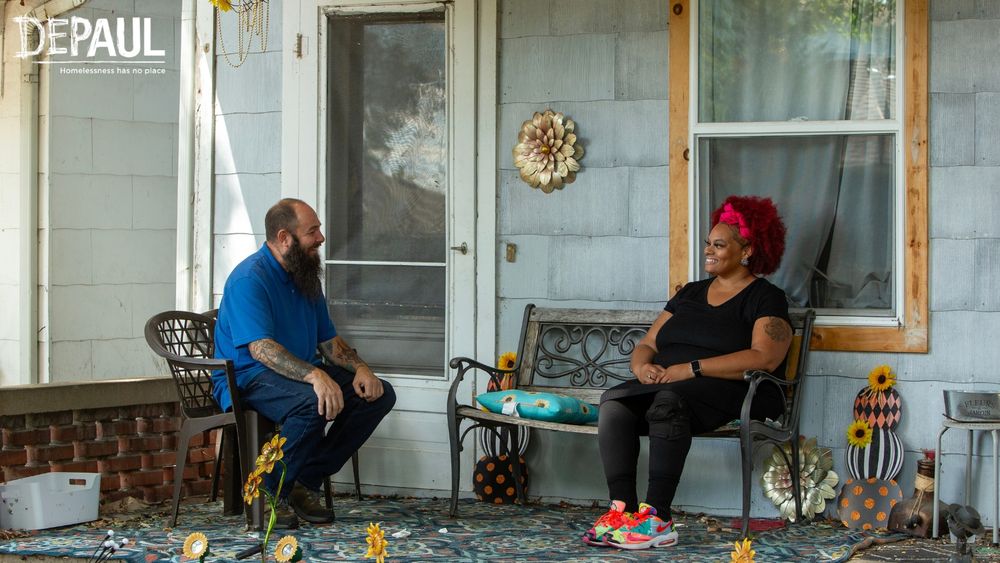 Depaul logo top left. Image shows a man and a woman sat on a porch next to one another.