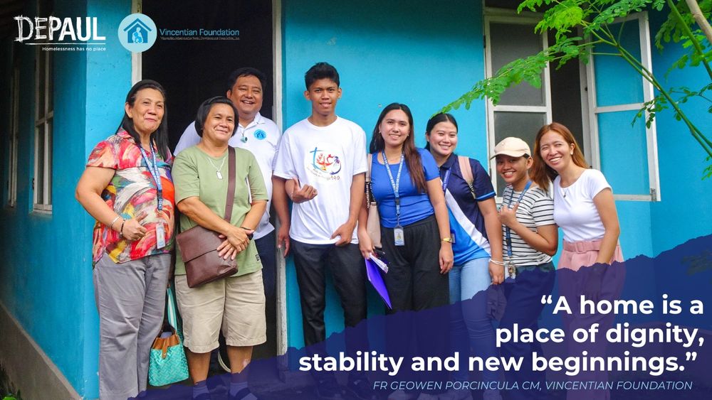 Depaul and Vincentian Foundations top left. Image shows families stood outside of housing. Text reads "A home is a place of dignity, stability and new beginnings' - Fr Geowen Porcincula CM, Vincentian Foundation.'