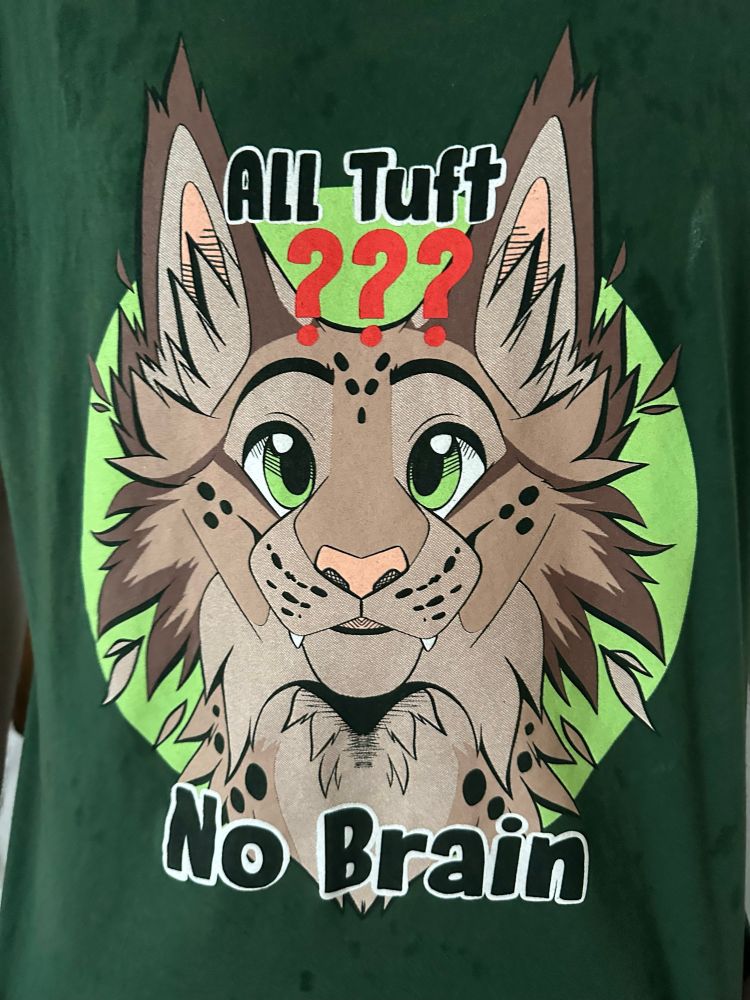A lynx shirt saying "all tuft no brain"
The joke is that Andrew gets confused for a lynx often 