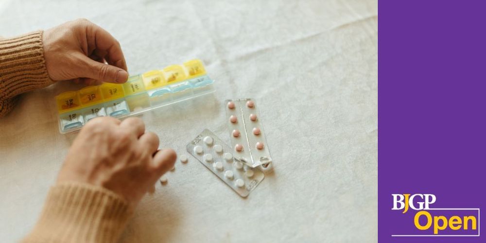 Hands sorting oral medications into a pillbox