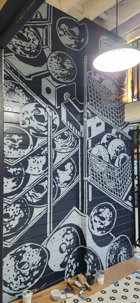 Mural painting of bagels and bakery equipment 