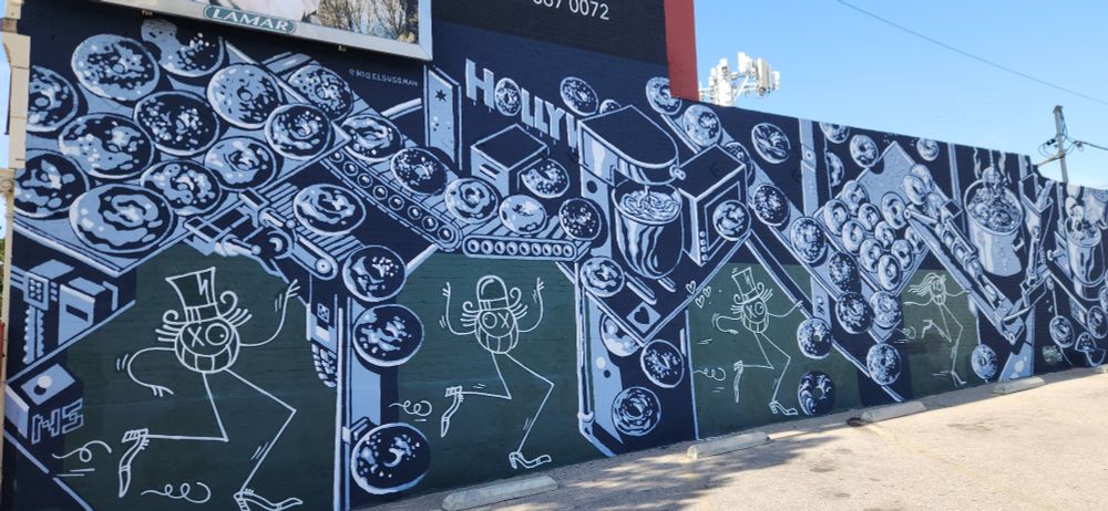 60ft long bagel themed mural in a parking lot in Los Angeles, CA