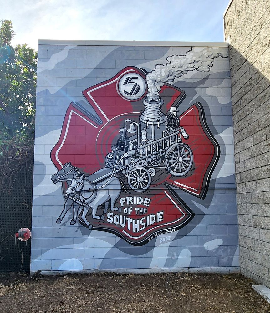 Mural painting by Nigel Sussman depicting horse drawn steam pumper on a crest at Station 5 in South Berkeley, California. Says "Pride of the Southside" 