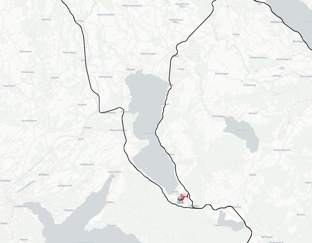 A screenshot of my rail map showing Lake Zug, lines are highlighted either side that shows I have travelled on a train.  A helicopter has been added to show the position of the earlier helicopter shot from the Tour de Suisse TV coverage.