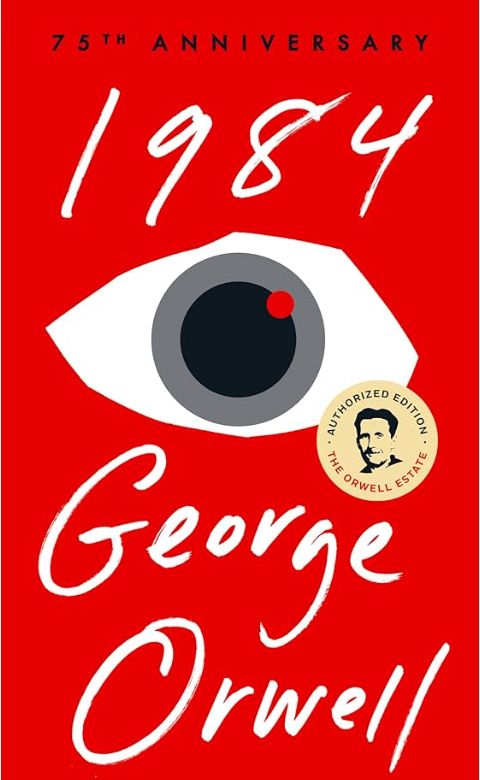 The seventy fifth anniversary cover of 1984 by George Orwell. The background is red with white stylised text reading "1984" at the top and "George Orwell" at the bottom. In the middle of the page is a large cartoon-style eye, as if cut out from pieces of paper and collaged, with a black pupil, grey iris, and a small red dot acting as a light reflection. It appears to replicate a camera.
