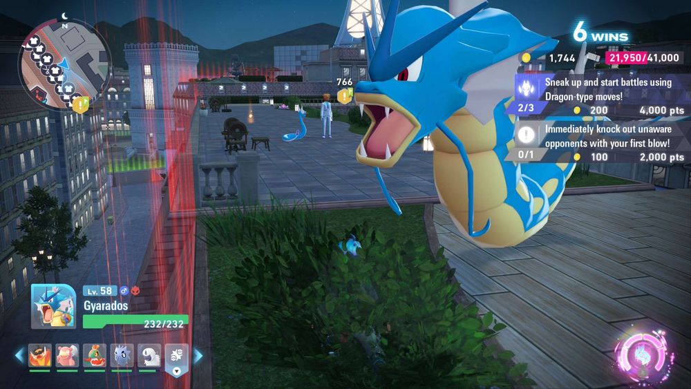 Pokémon Legends Z-A screenshot, my player character is hiding from another trainer in a bush. My partner alpha garydos is spawned in next to me.