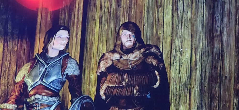 Lydia and Jeremiah the Breton in skyrim. 