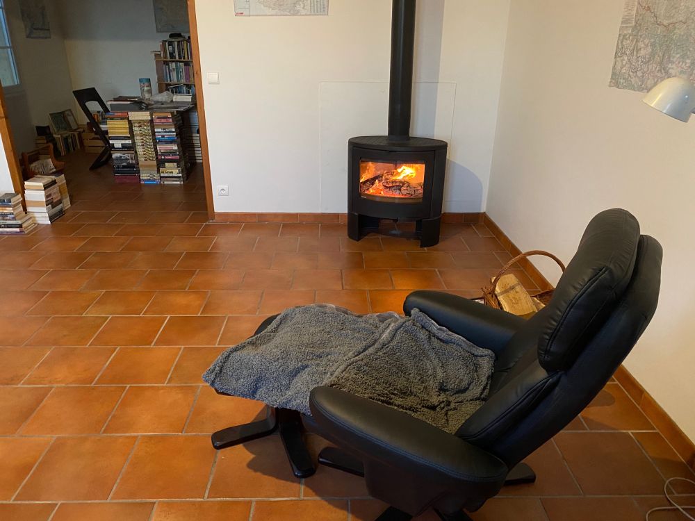 A fire in the woodstove, a fleece on the reading chair, and a house full of books. 