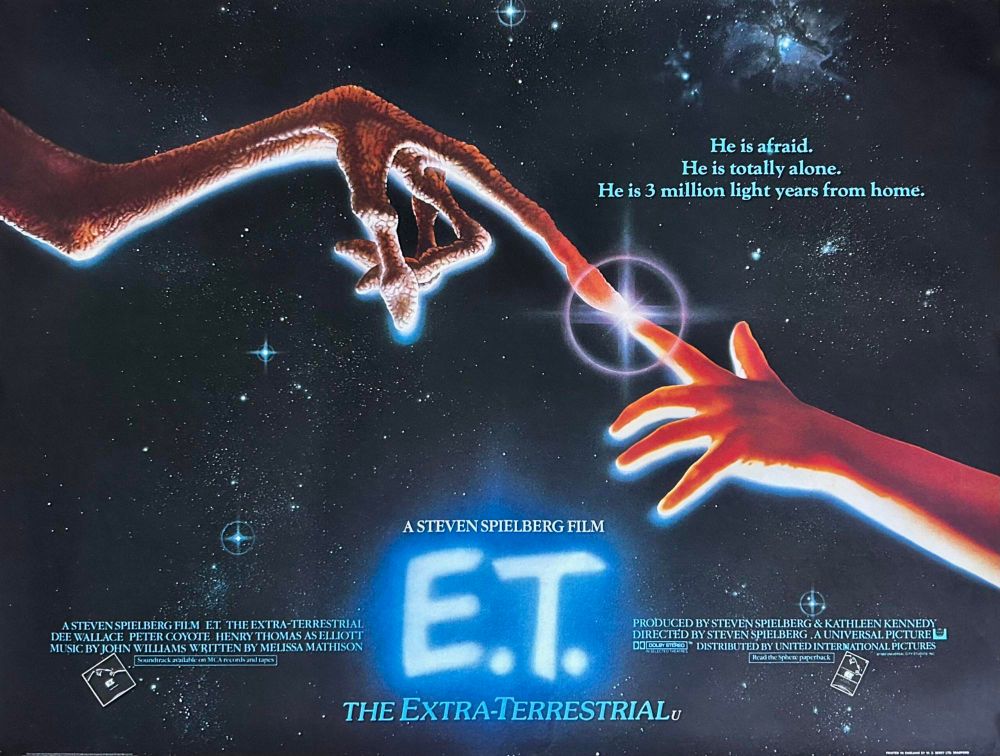 A STEVEN SPIELBÉRG FIİM ET. THE EXTRA-TERRESTRIAL DEE WALLACE PETER COYOTE HENRY THOMAS AS ELLIOTT MUSIC BYJOHN WILLJAMS WRITTEN BY MELISSA MATHISON

He is 3 million light years from home.

ASTEVEN SPIELBERG FILM

Soundtrack available on MCA reords and taps

He is afraid. He is totally alone.

THE EXTRATERRESTRIALu

PRODUCED BY STEVEN SPIELBERG& KATHLEEN KENNEDY DIRECTED BY STEVEN SPIELBERG,AUNIVERSAL PICTURE DO oaO" DISTRIBUTEDBY UNITED INTERNATIONAL PICTURES