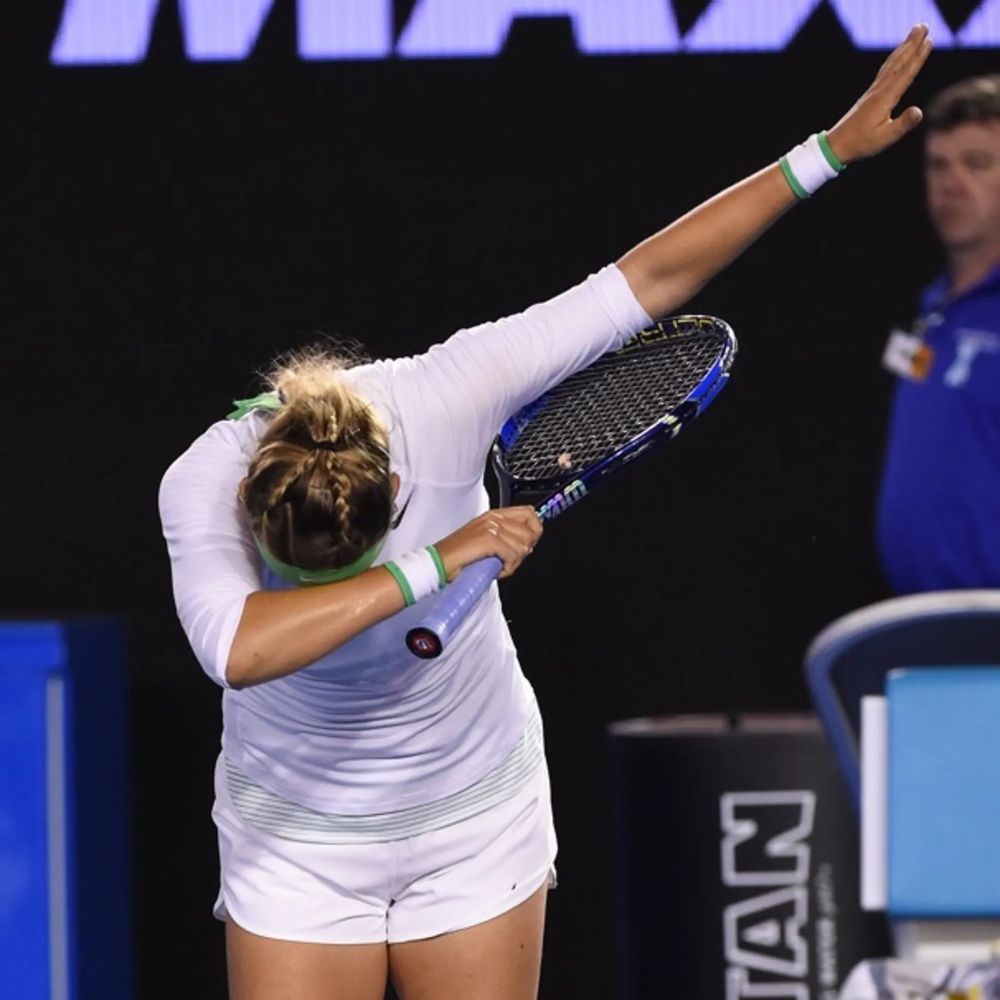 Azarenka dabbing to the crowd after a win