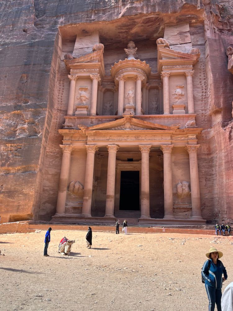 Incredible temple entrance facade cut into the red/pink coloured sandstone mountain. Two levels: lower level insists on 6 Columns 
and a massive doorway. 