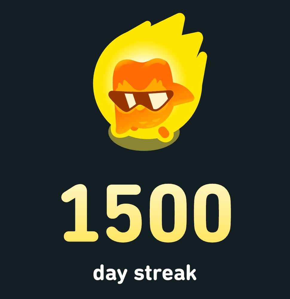 Screenshot of Duolingo app celebrating a 1500 day steak. Duo the owl is on fire and wearing sunglasses