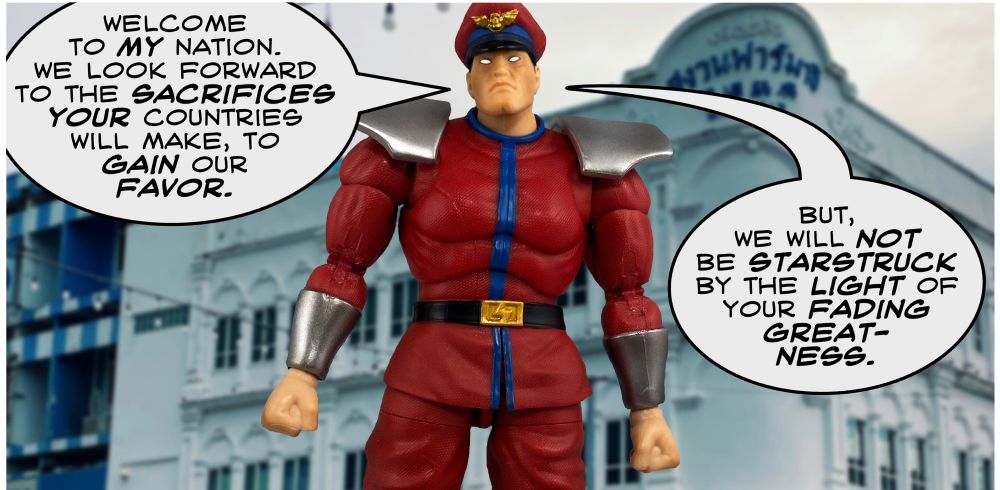 To his visitors, Bison declares, "WELCOME
TO MY NATION. WE LOOK FORWARD TO THE SACRIFICES YOUR COUNTRIES WILL MAKE, TO GAIN OUR FAVOR. BUT, WE WILL NOT
BE STARSTRUCK BY THE LIGHT OF YOUR FADING GREATNESS."