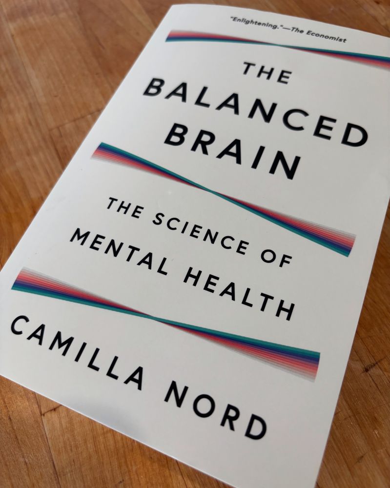 A book displaying the title “The Balanced Brain: The Science of Mental Health” by Camilla Nord