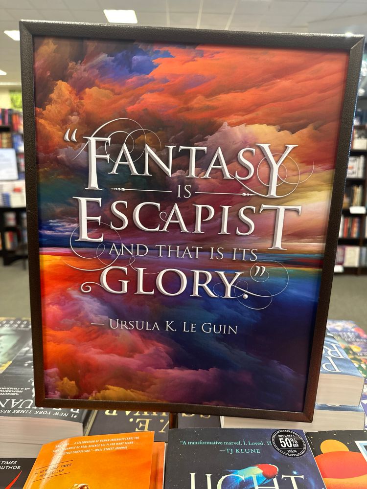 A sign in a Barnes and noble that says Fantasy is escapist and that is glory- Ursula K LeGuin