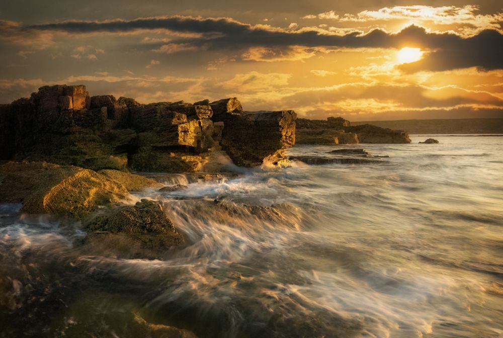 Waves on the rocks are relentless, never bowing and never giving in. They just keep right on fighting.