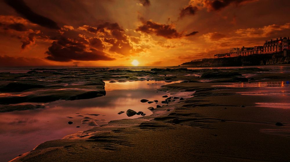 Sunrise on Whitley Bay beach in the UK.