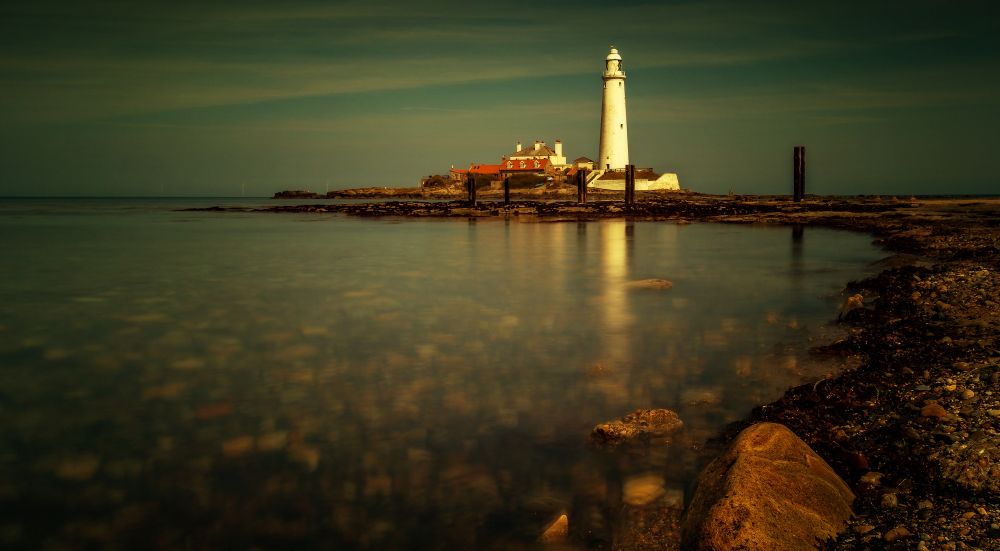  Calm sea at St. Marys Lighthouse in the UK.
