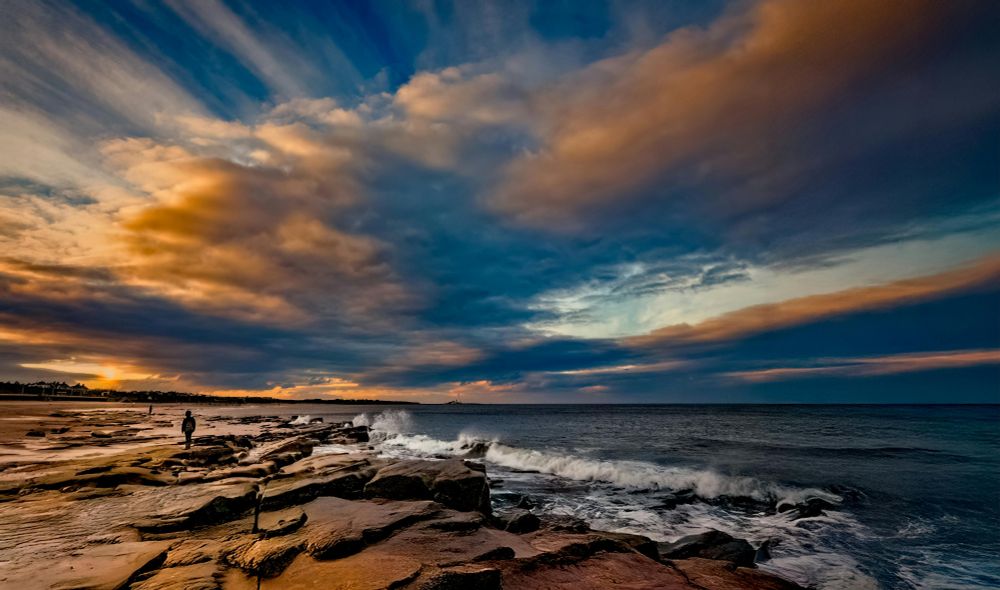 Evening clouds on Whitley Bay beach in the UK