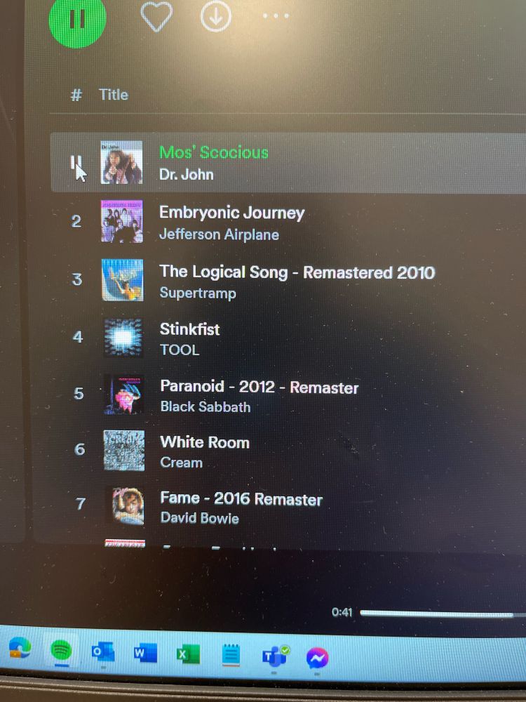 Photo of Spotify music list with Dr John, Supertramp, Tool, Black Sabbath, and David Bowie.