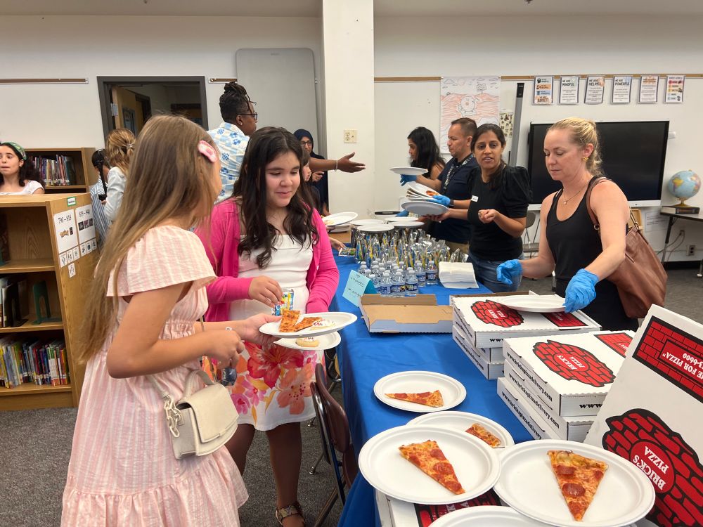 Pizza, cookies and drinks in the library after the ceremony