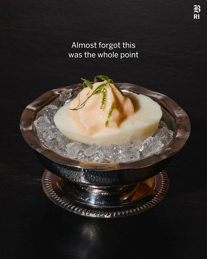 4: This is a photo of The deviled egg "Jello" shot at Club Frills, a new funky bar in Providence, R.I. The text on this slide reads: Almost forgot this was the whole point.