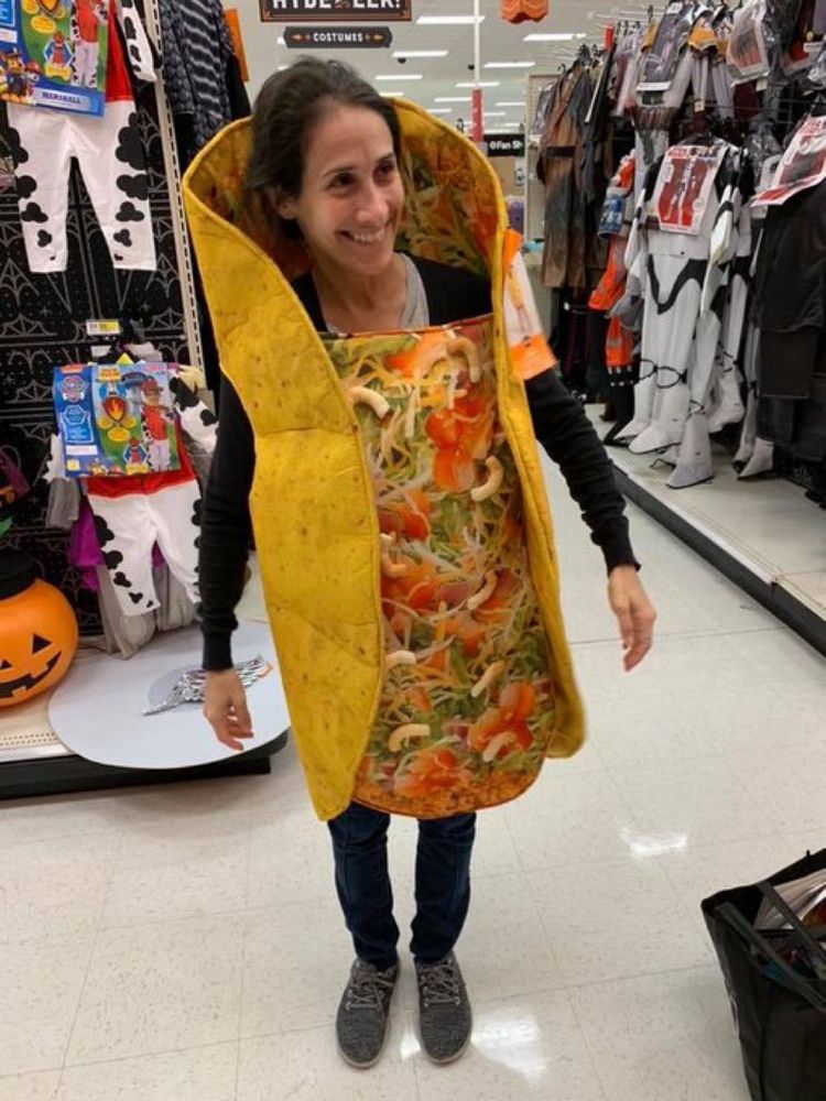 A photo of a woman in a “taco” costume 