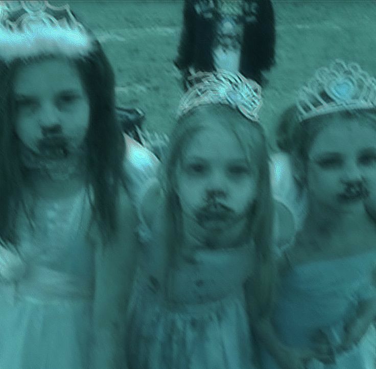 photo of three little girls in party princess dresses and crowns with bleeding noses, under blue-green filter. https://ca.pinterest.com/pin/936537685022068465/
