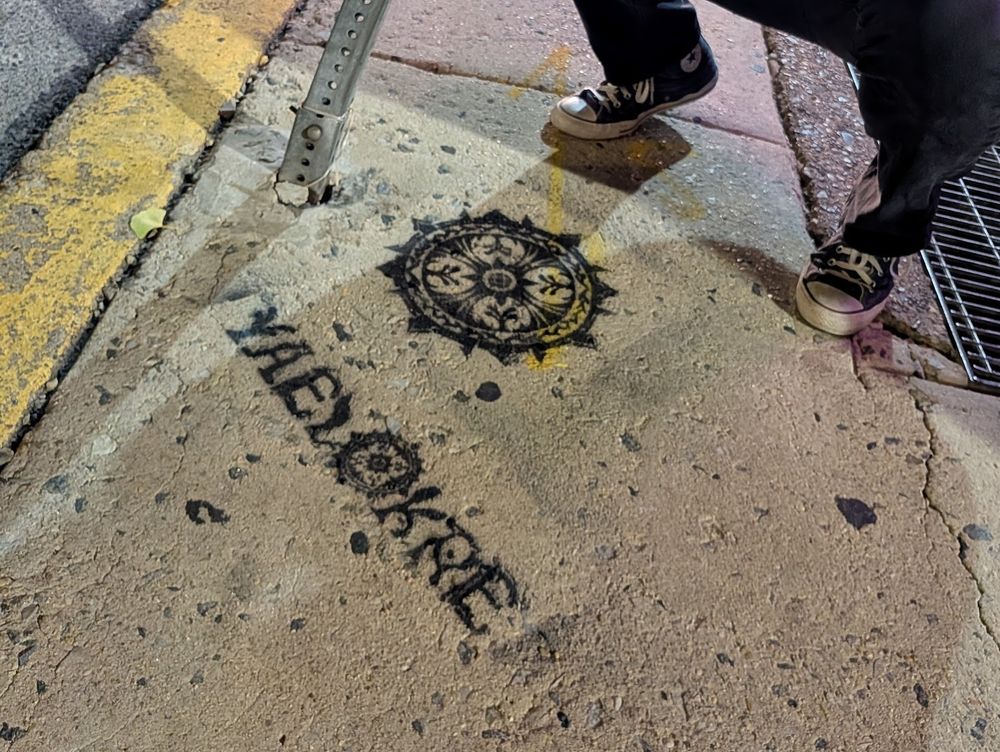 a picture of me next to an awesome yaelokre stencil, with most of me missing. I'd probably be comfortable posting the original if I had taken the time to shave beforehand >.>