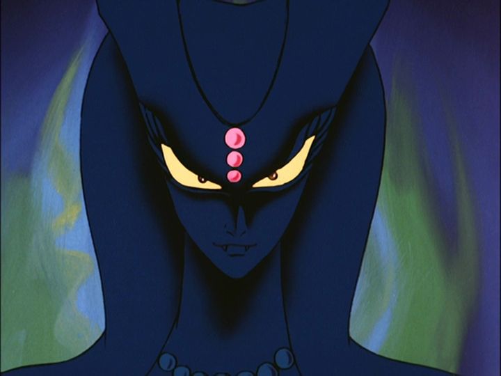 Giant villain head in shadow. I think they were going for an ancient egyptian influence, can't describe this well