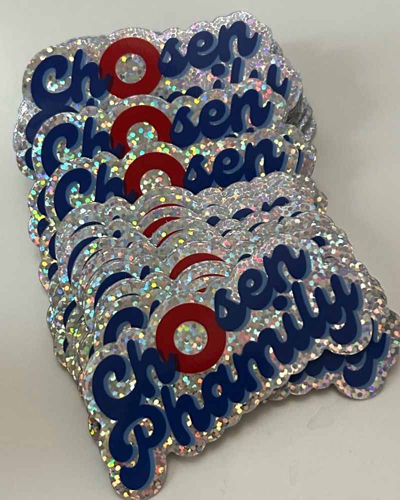 Glitter sticker that says “chosen phamily”. The O is a phish donut 