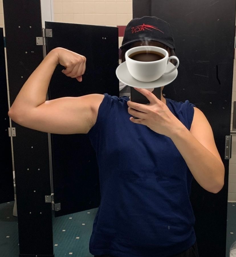 An after picture of myself from yesterday flexing an arm. The arm is now thicker and more defined.