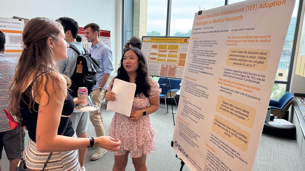 Photo of Carnegie Mellon REUSE student presenting their research during the REUSE poster session