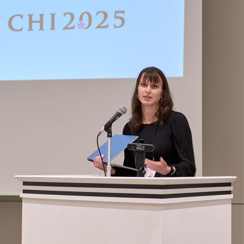 Photo of Anna Gerchanovsky presenting research at CHI 2025