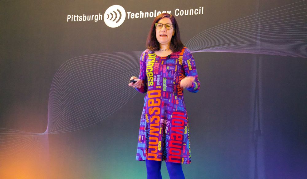 Photo of Lorrie Cranor giving the keynote presentation at Cyburgh 2025