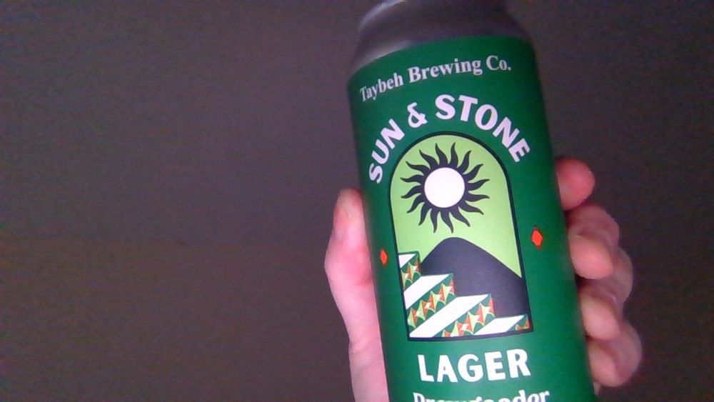 The front of the Sun and Stone lager can.