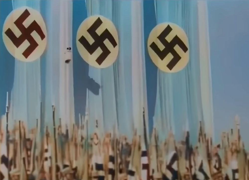 A colour image from a Nazi propaganda film. Note the colour of the banners: REFORM BLUE - sorry, the same colout blue that Reform uses. A coincidence?
Hm.