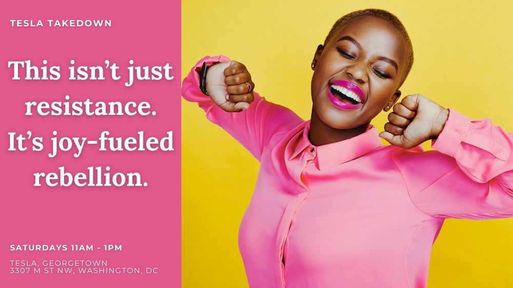 Black woman wearing pink dress shirt dancing and smiling.