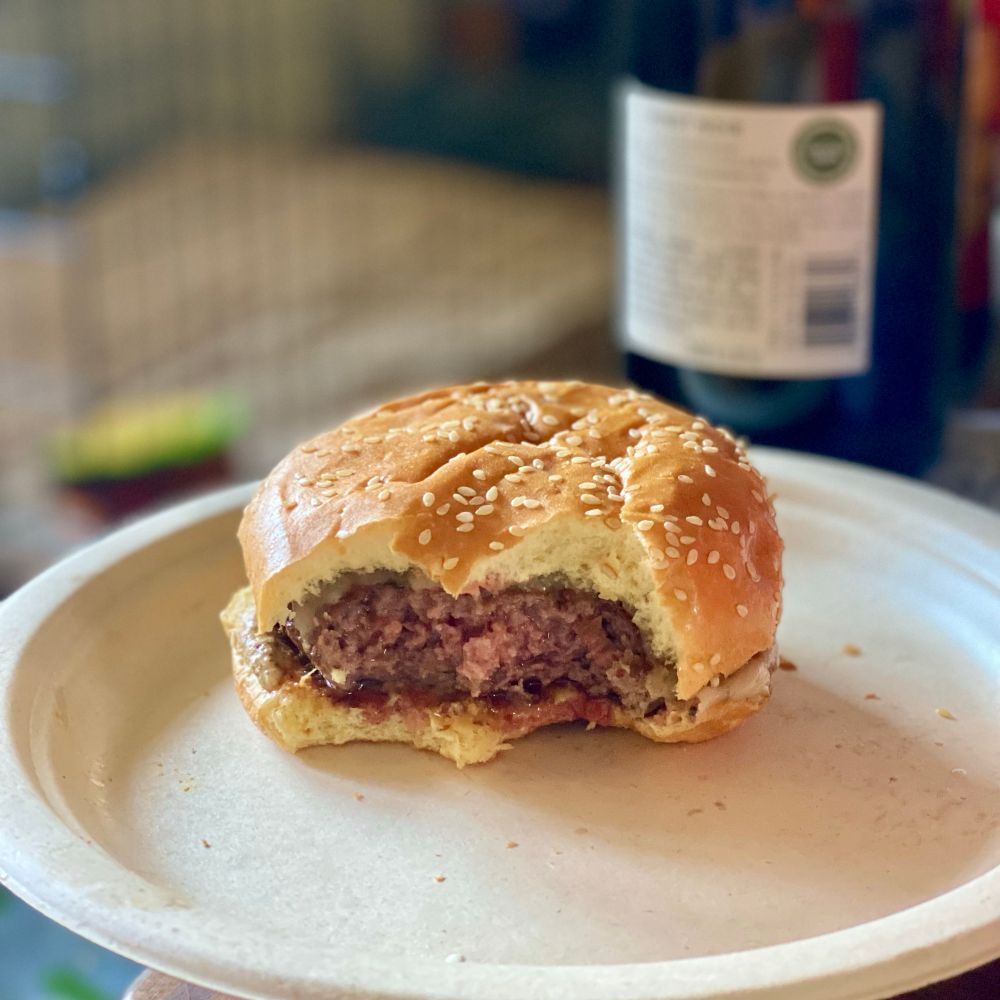 A burger with a few bites taken out