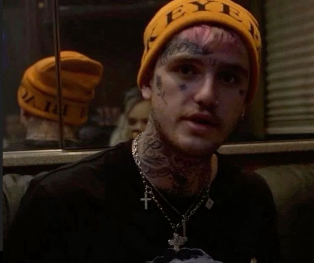 lil peep in an orange beanie