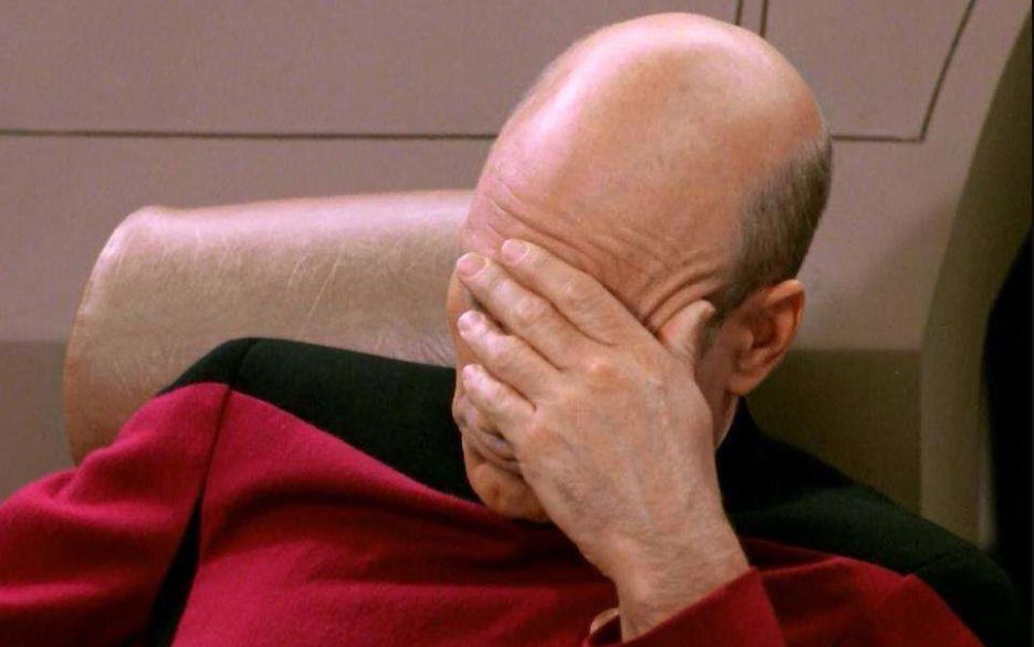 Picard with his hand over his forehead, very frustrated 