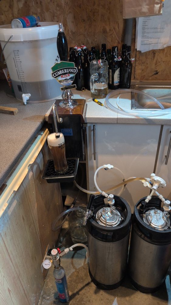 2 kegs, one with it's own tap, the other connected to a beer engine. 