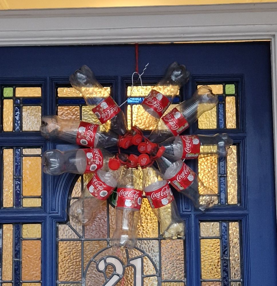 Wreath made from empty plastic coca cola bottles