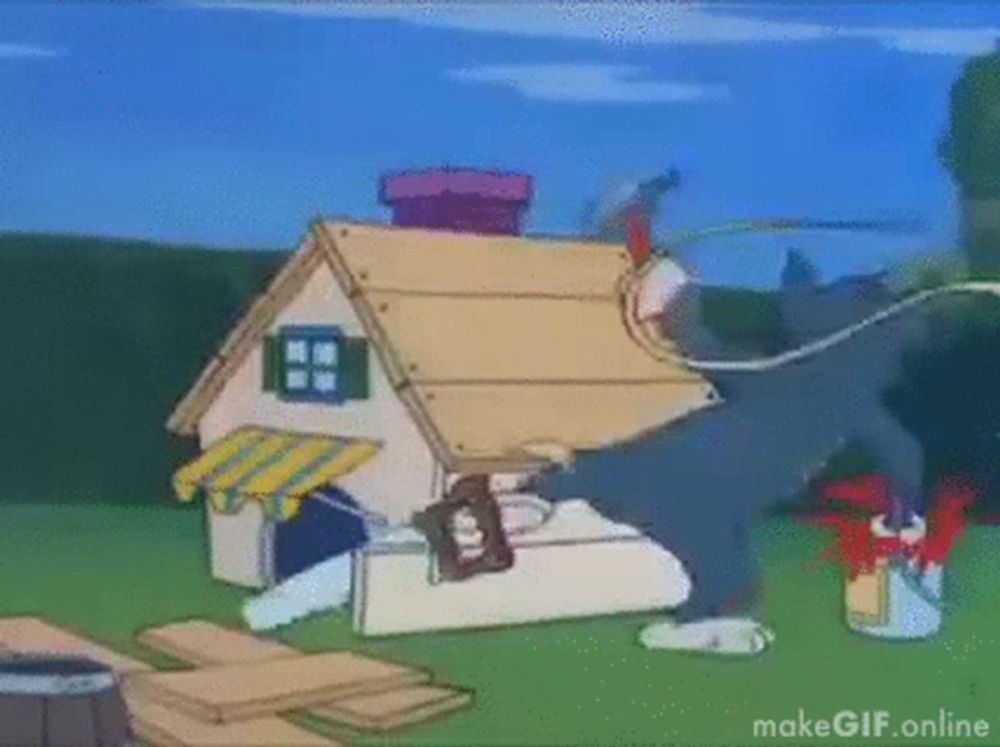 a cartoon of tom and jerry breaking down a house