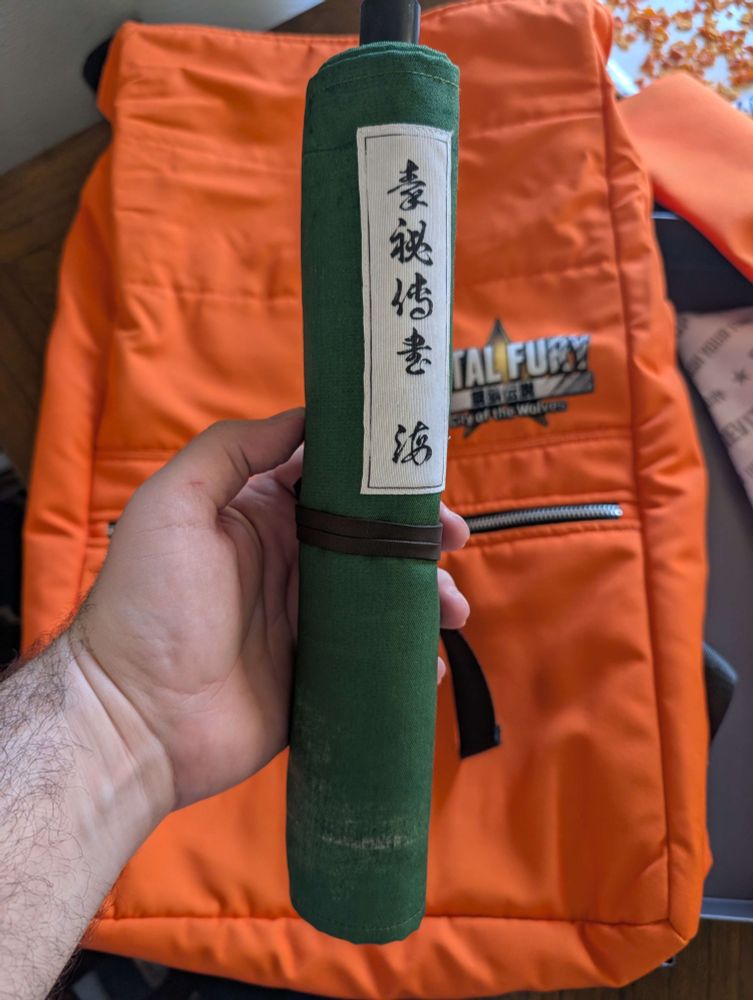 FATAL FURY: City of the Wolves backpack and sealed Jin scroll