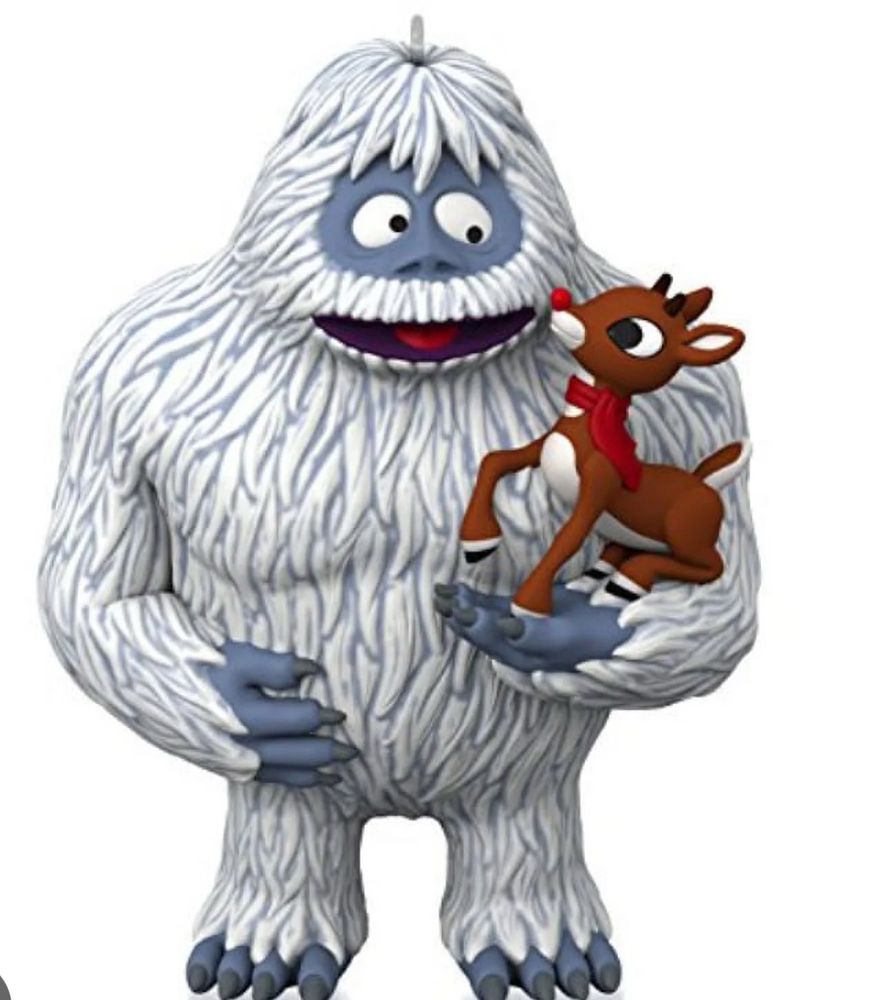 Image of Rudolph the red-nosed reindeer being held by the abominable snow monster 