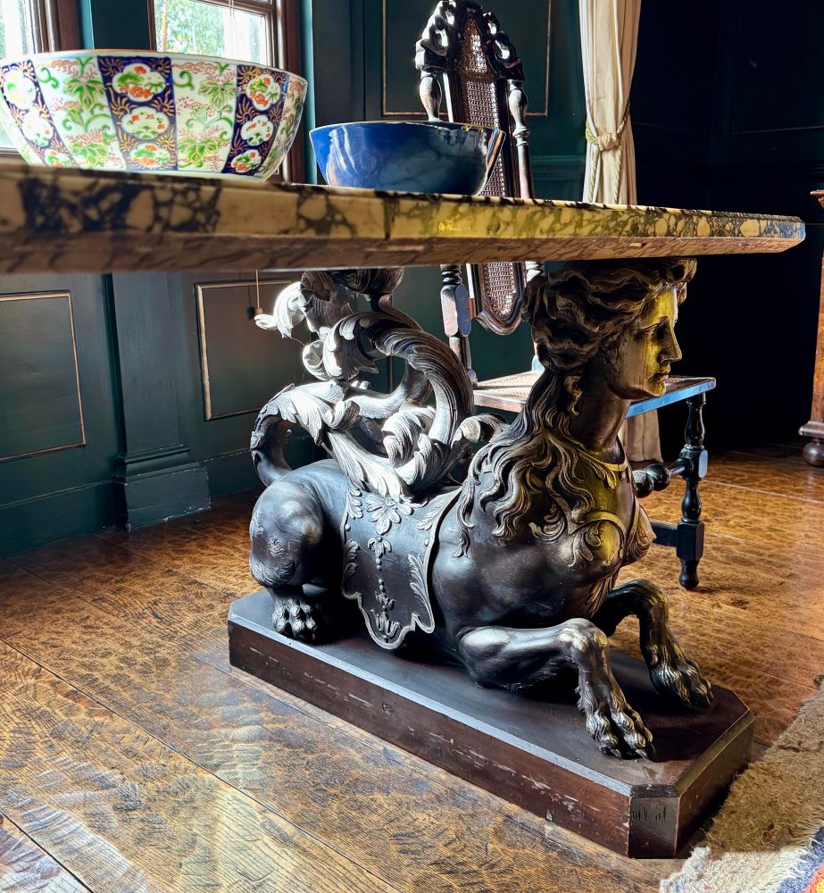 Fancy caryatid support for a table