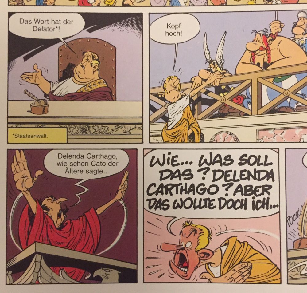 Es ist eines Seite aus dem Asterix Heft „die Lorbeeren des Cäsar“. Der Staatsanwalt beginnt sein Plädoyer mit dem Cato Zitat was nichts zur Sache beiträgt und der Verteidiger von Asterix regt sich auf weil er dieses Zitat ohne Bezug zur Sache verwenden wollte. 