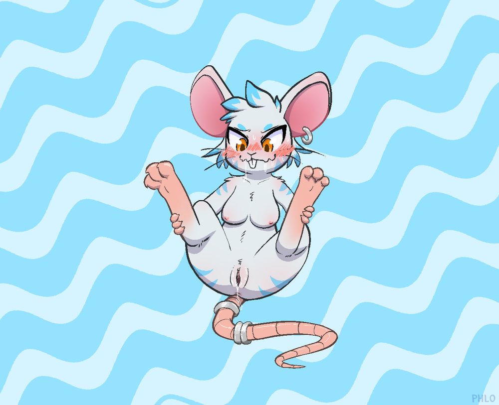 Iris sitting and raising both legs up while holding them, presenting herself