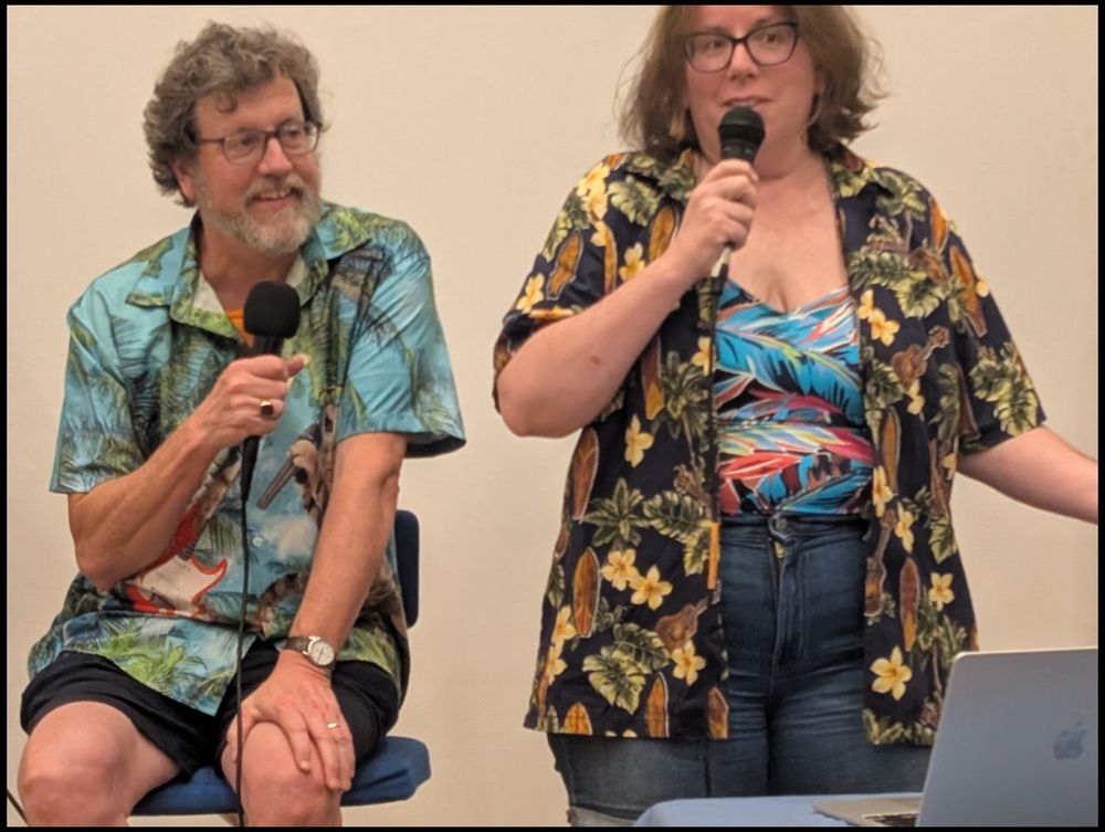 Dennis and Mary in their let's-go-down-the-shore-already attire. The screen background is so stark someone could easily edit Reggie in there.